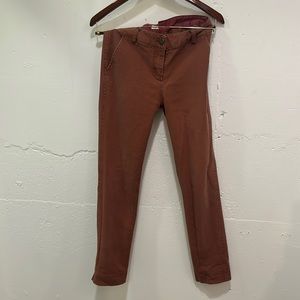 Rust colored bridge and burn pants